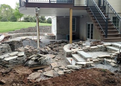 Construction of stone retaining walls and steps